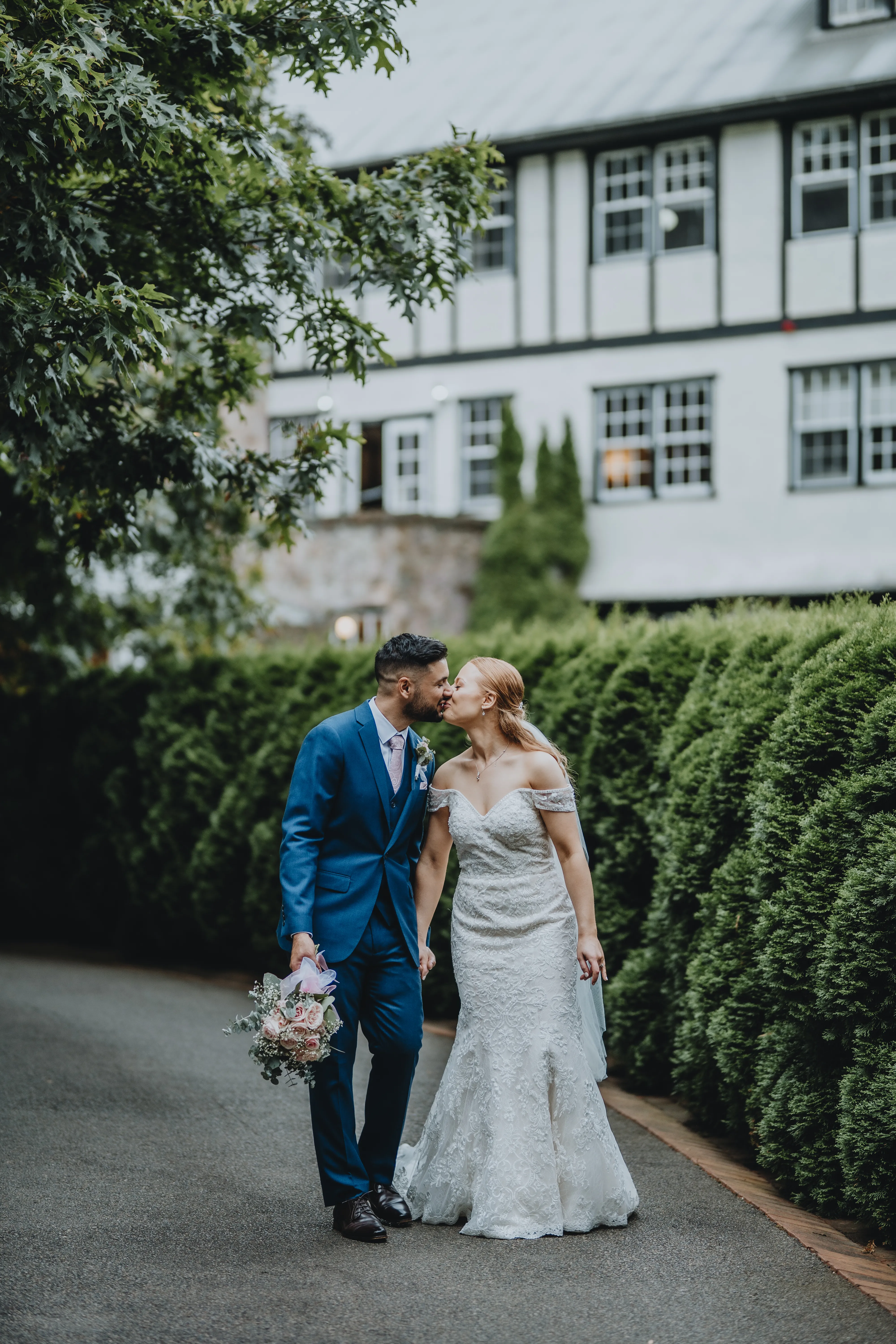 Bride and groom sharing a kiss at Marybrooke Manor, Melbourne wedding photography